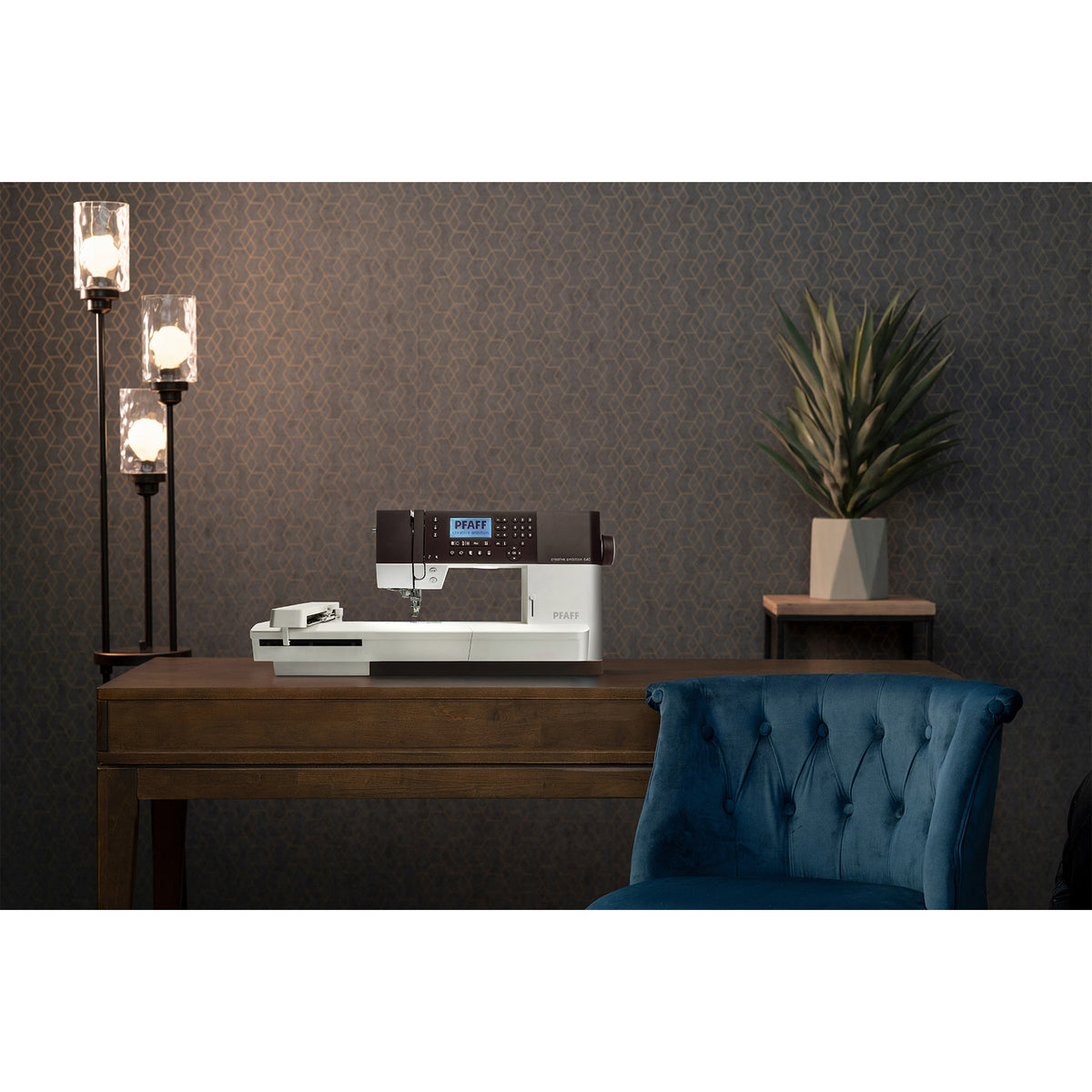 PFAFF creative ambition 640 displayed in a premium home sewing studio