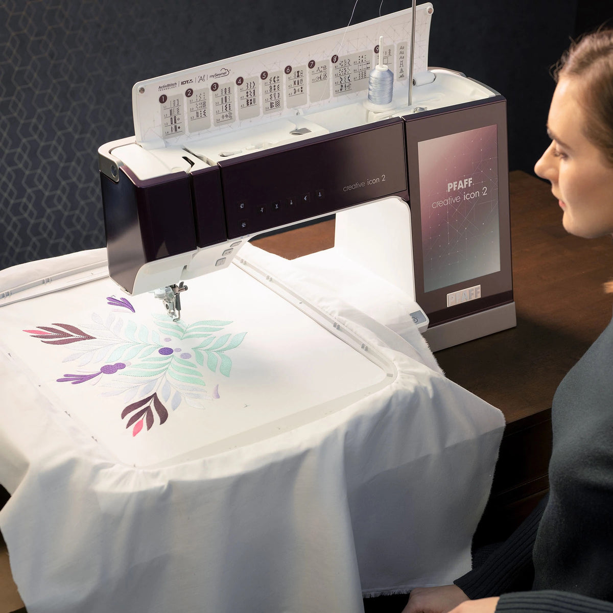 PFAFF creative icon 2 embroidering a large floral design in the Grand Dream Hoop